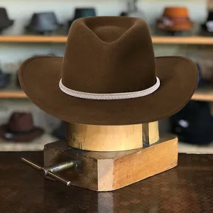 Brown Triangular Crown Hat with Curved Wavy Brim and White Leather Hatband